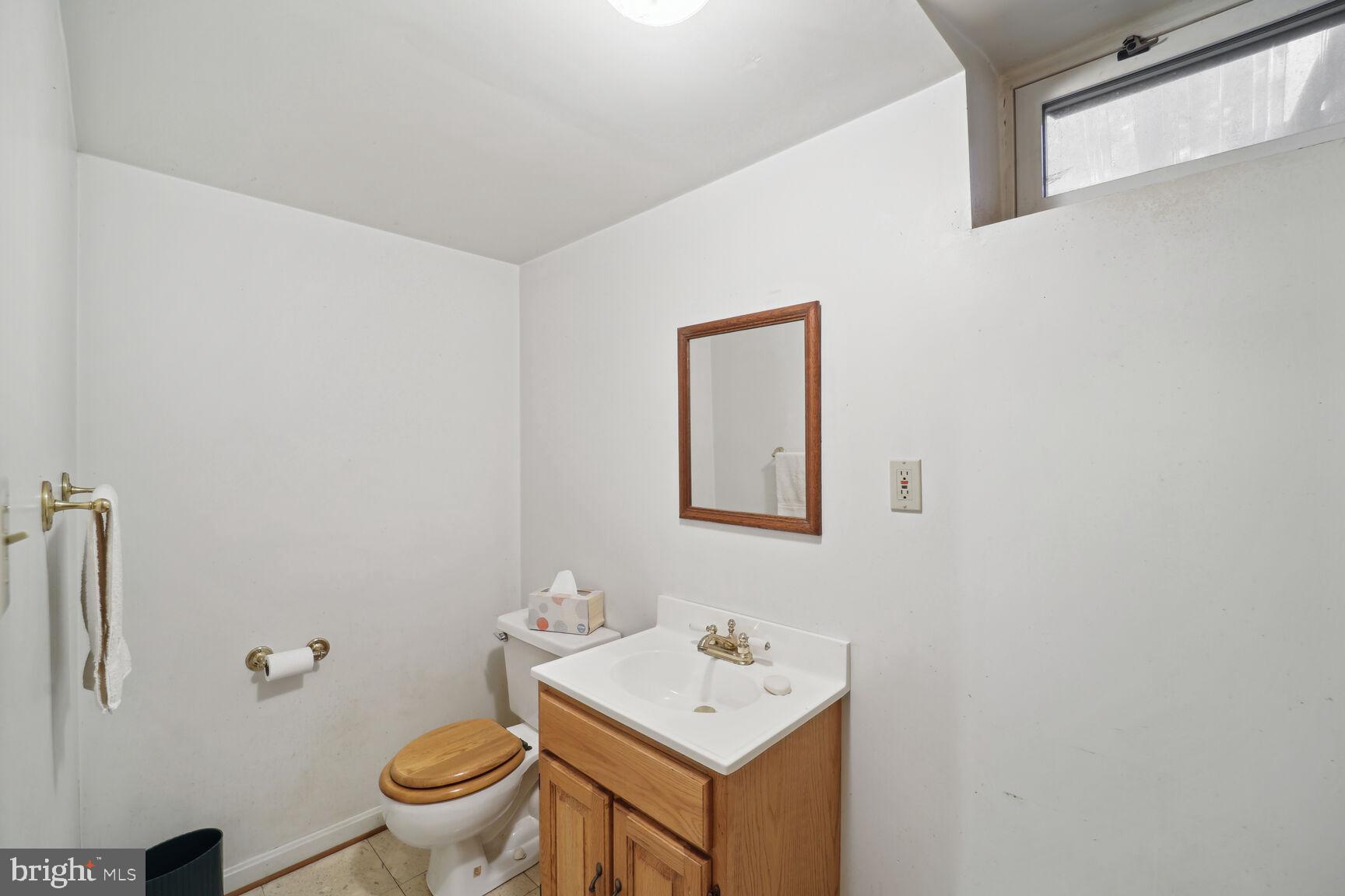 5908 Wolverton Lane Clinton, MD 20735 - Photo 21 of 27 Basement half bath
