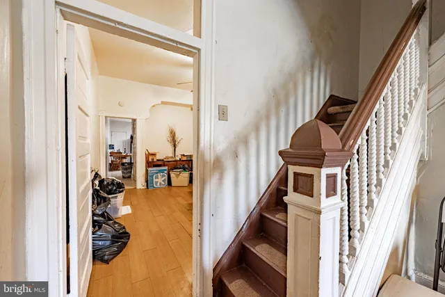 a workspace with furniture and wooden floor
