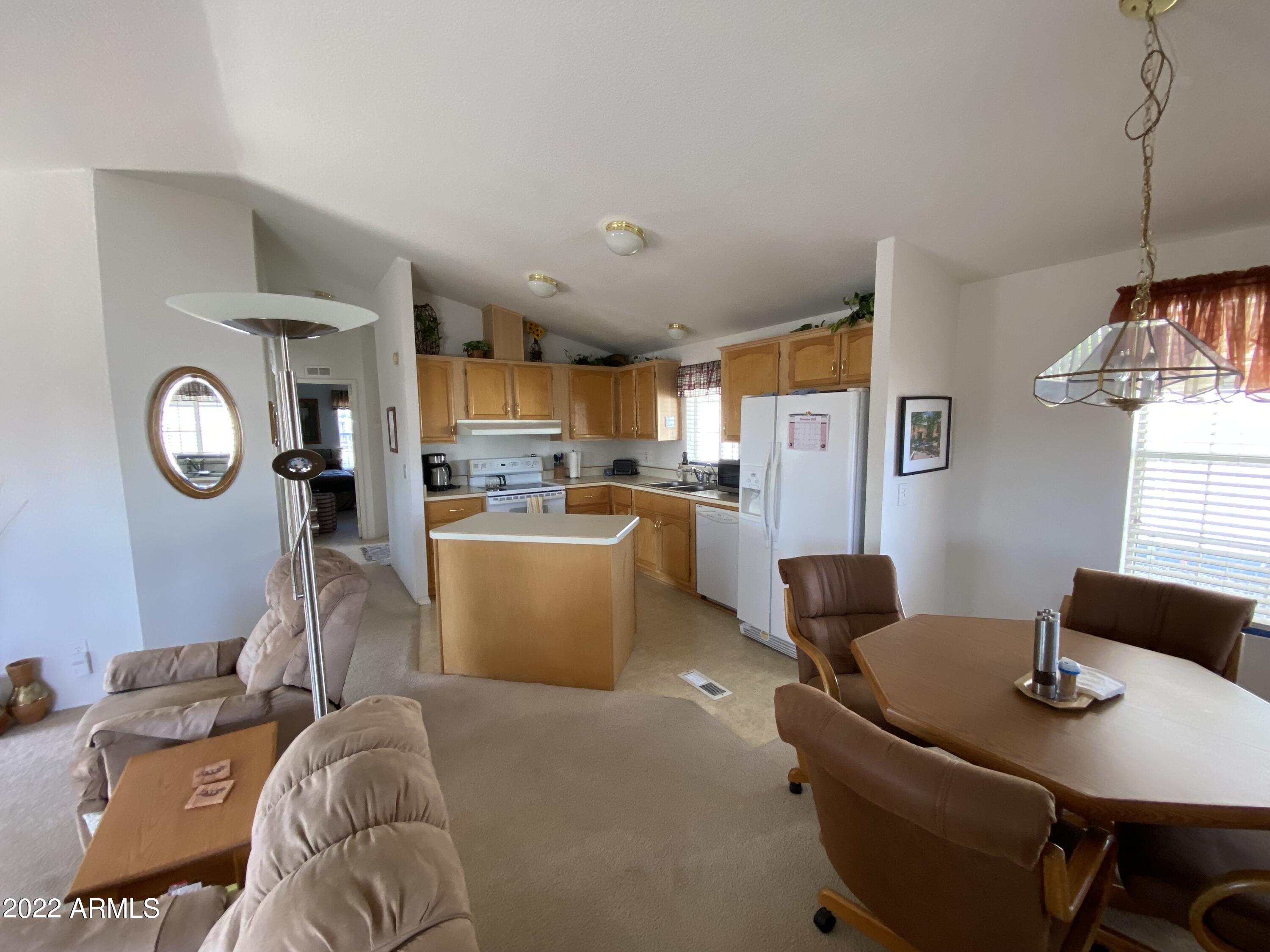 301 South Signal Butte Road, Unit 15 Apache Junction, AZ 85120 - Photo 21 of 30 living to hallway IMG-8692