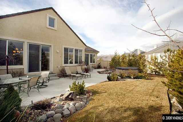 1550 Caughlin Creek Road Reno, NV 89519 - Photo 8 of 9 a view of swimming pool with outdoor seating and plants
