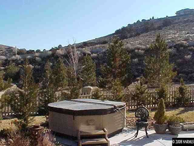 1550 Caughlin Creek Road Reno, NV 89519 - Photo 9 of 9 a view of a backyard with sitting area