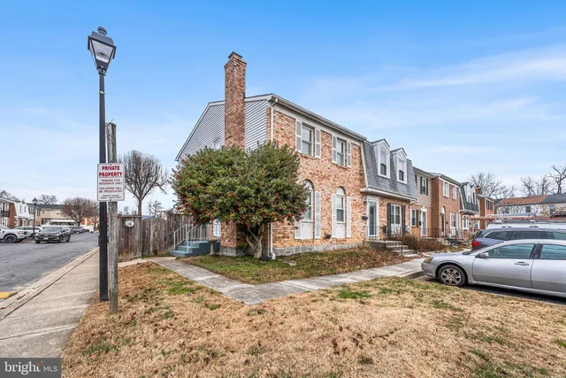 a view of a street with cars on road