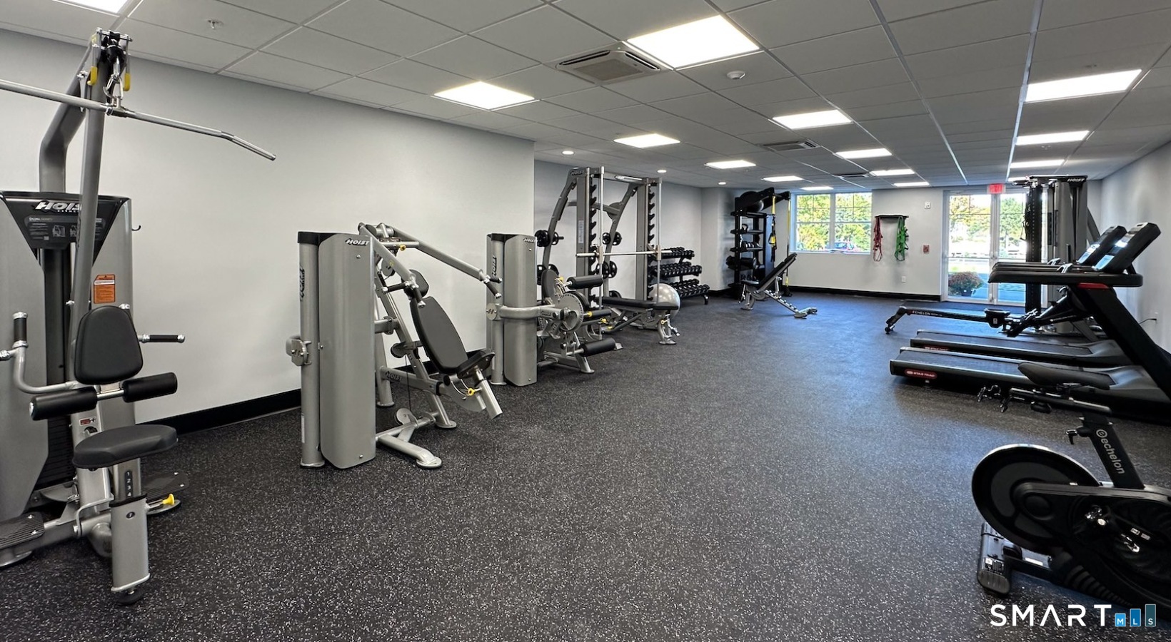52 Maple Street, Unit 101 Branford, CT 06405 - Photo 17 of 18 a view of a room with gym equipment