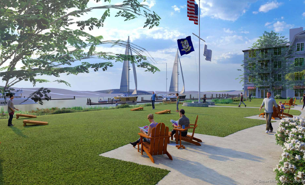 52 Maple Street, Unit 101 Branford, CT 06405 - Photo 2 of 12 a view of a park with a bench