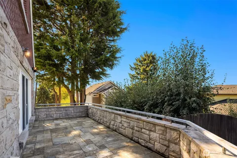 a view of a building with a yard