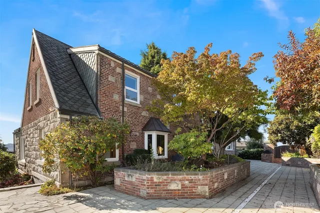 an aerial view of a house with a garden
