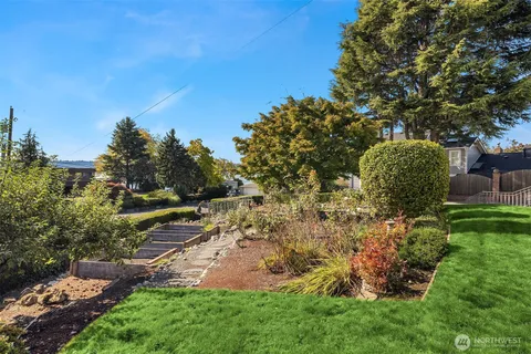 an aerial view of a house with a garden