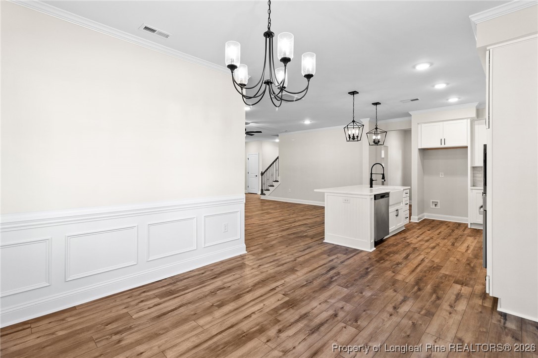 944 Rhum Drive Fayetteville, NC 28311 - Photo 12 of 49 a view of a kitchen with wooden floor