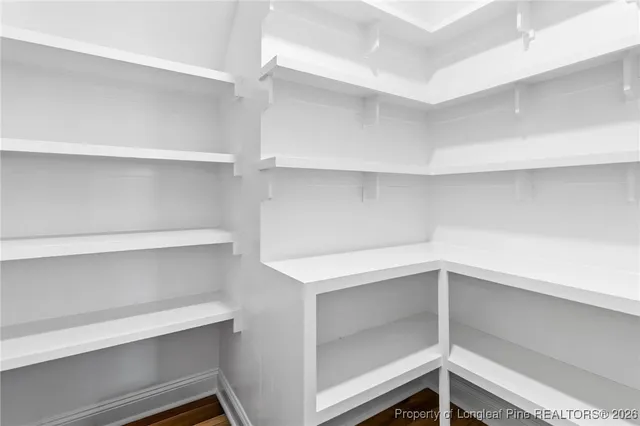 a view of an empty walk in closet