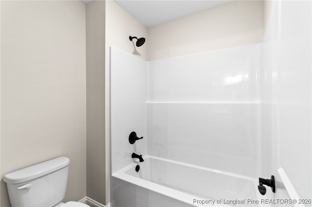 944 Rhum Drive Fayetteville, NC 28311 - Photo 33 of 49 a bathroom with a bathtub and a toilet