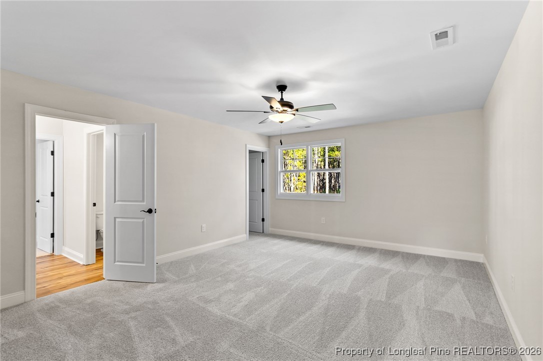 944 Rhum Drive Fayetteville, NC 28311 - Photo 35 of 49 wooden floor in an empty room with a window