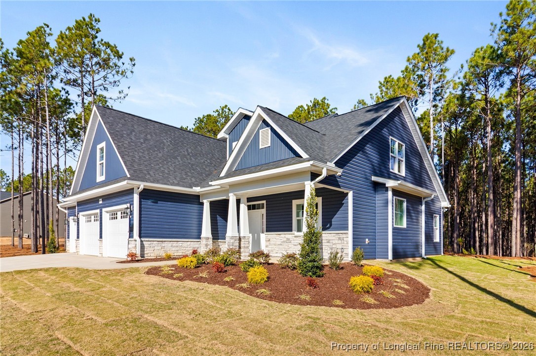 944 Rhum Drive Fayetteville, NC 28311 - Photo 4 of 49 a front view of a house with a porch