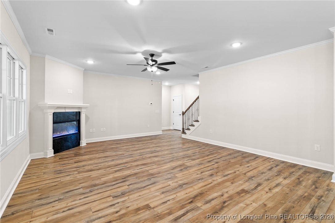 944 Rhum Drive Fayetteville, NC 28311 - Photo 10 of 49 a view of an empty room with a ceiling fan and window