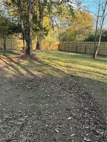 a view of a yard with a trees
