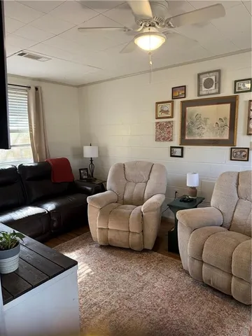 a living room with furniture and a couch