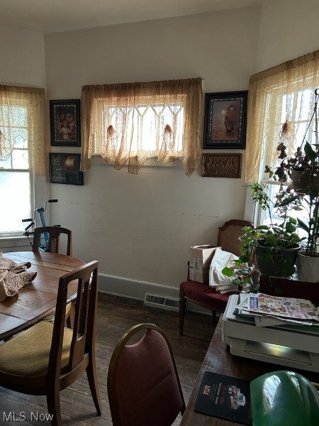3439 Fulton Road Cleveland, OH 44109 - Photo 18 of 19 Dining area with dark hardwood / wood-style floors and a wealth of natural light