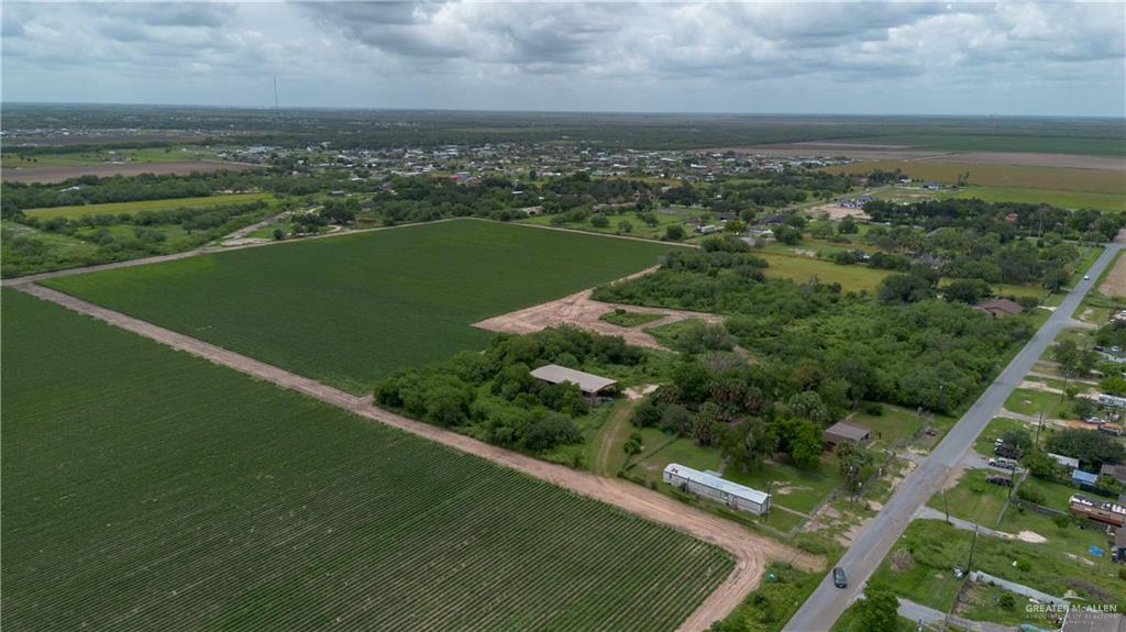 1917 South Victoria Road Donna, TX 78537 - Photo 4 of 4 an aerial view of a residential houses with outdoor space and trees