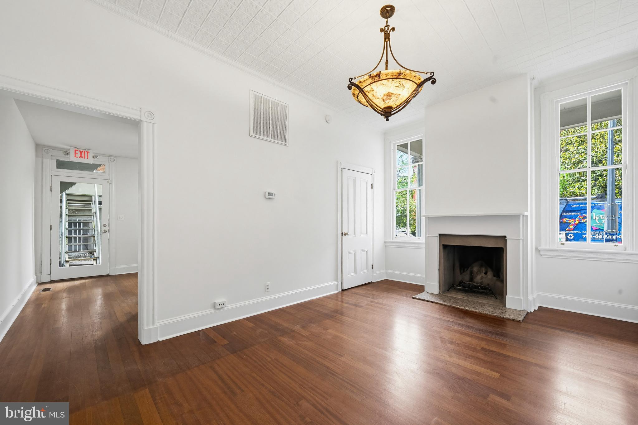 400 7th Street Southeast Washington, DC 20003 - Photo 9 of 23 a view of a room with wooden floor fireplace and window