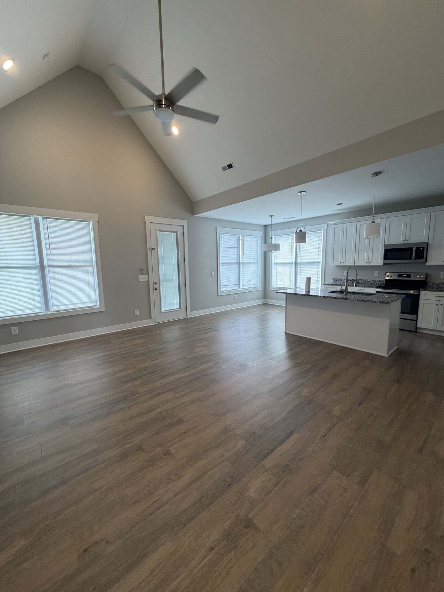 442 Bill Fuson Road McMinnville, TN 37110 - Photo 14 of 29 a view of a kitchen with microwave and cabinets