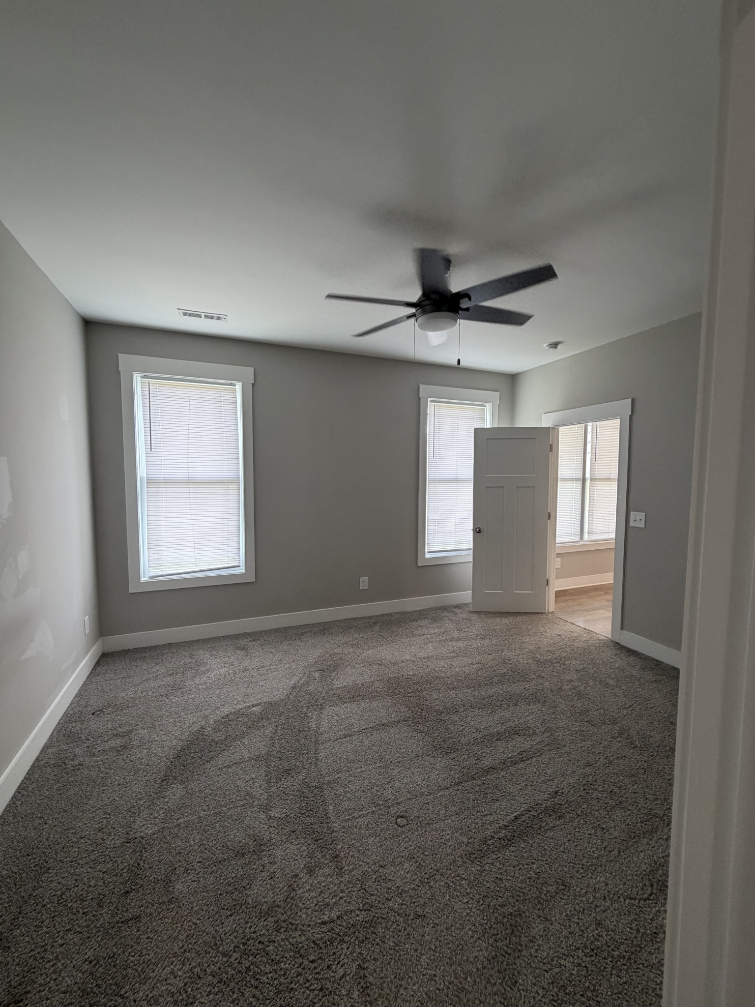 442 Bill Fuson Road McMinnville, TN 37110 - Photo 19 of 29 a view of a livingroom with a ceiling fan and window