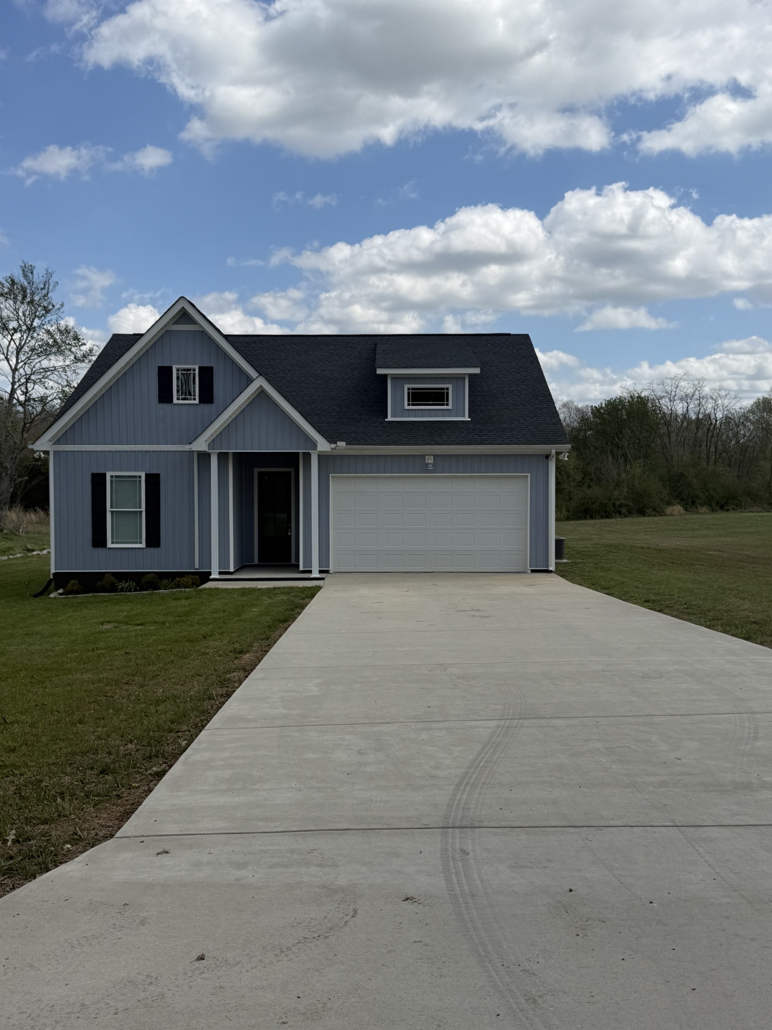 442 Bill Fuson Road McMinnville, TN 37110 - Photo 2 of 29 a front view of a house with a yard