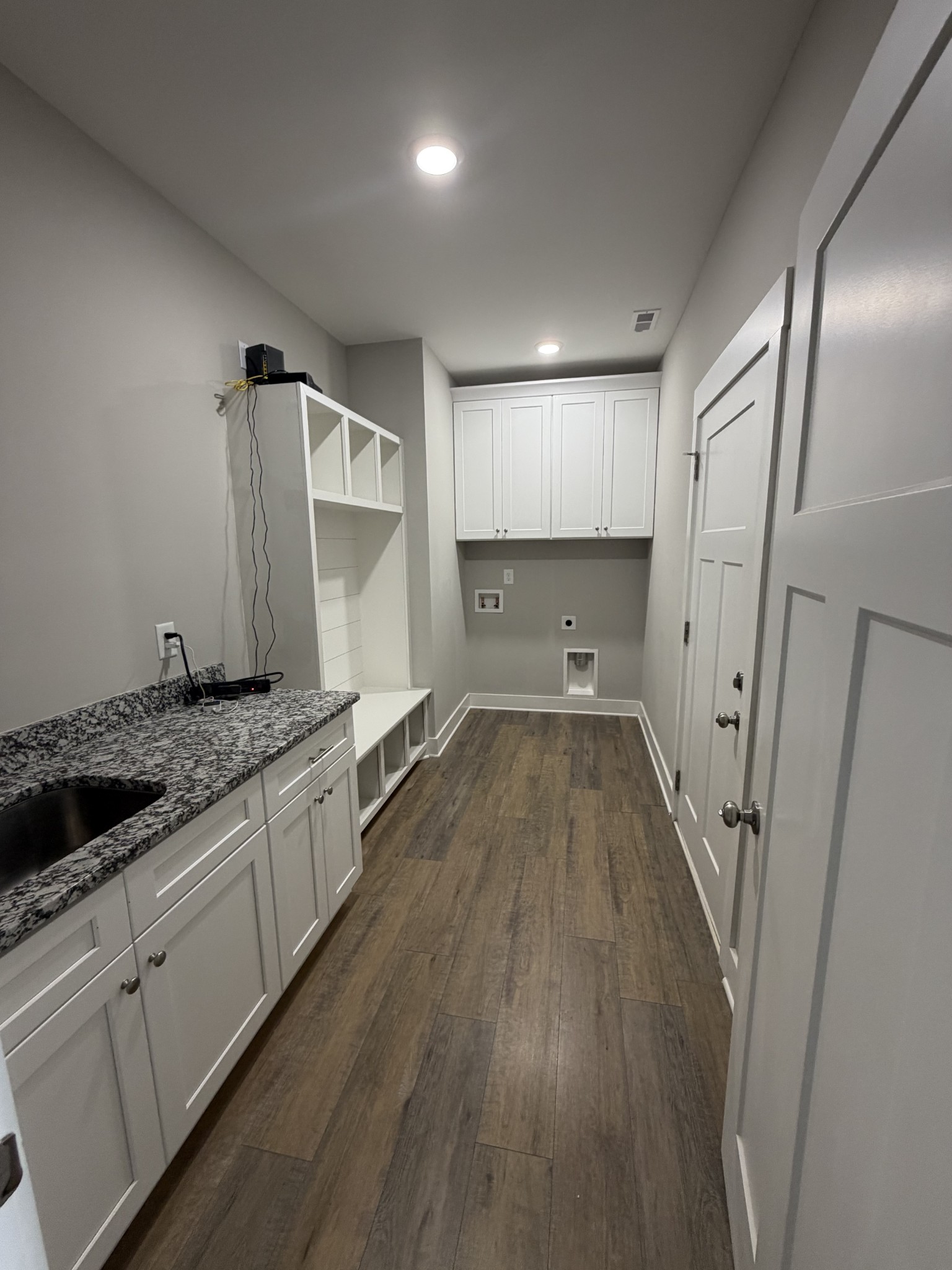 442 Bill Fuson Road McMinnville, TN 37110 - Photo 5 of 29 a view of a kitchen with a sink and wooden floor