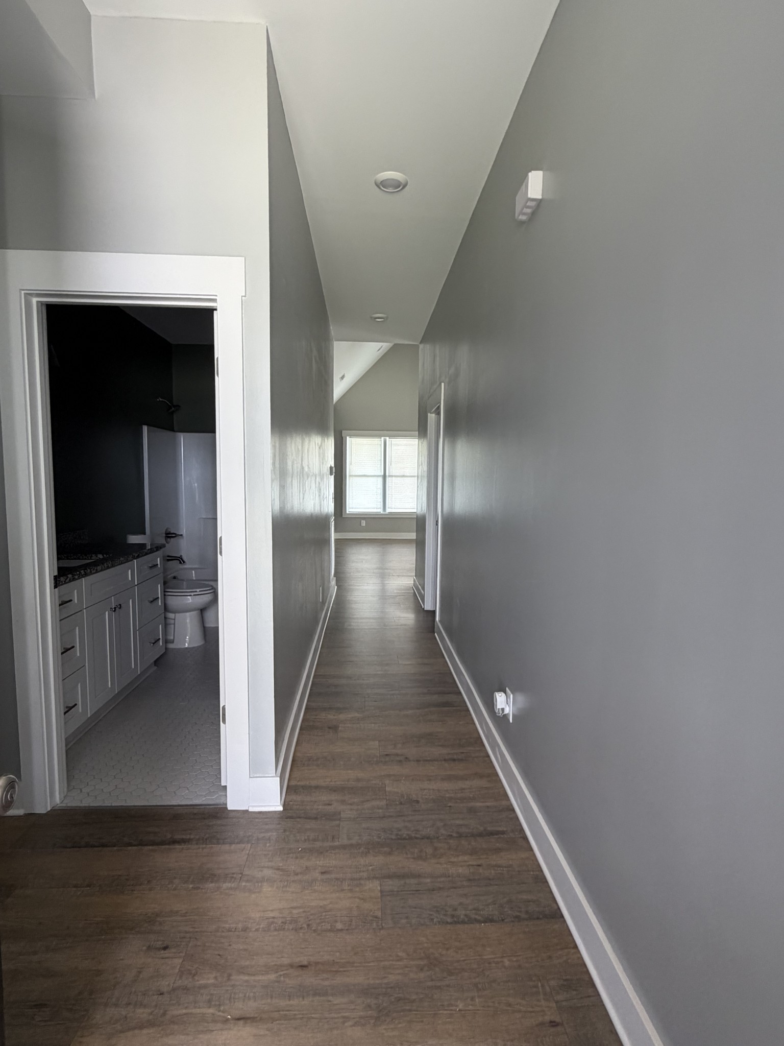 442 Bill Fuson Road McMinnville, TN 37110 - Photo 6 of 29 a view of a hallway view with wooden floor and staircase