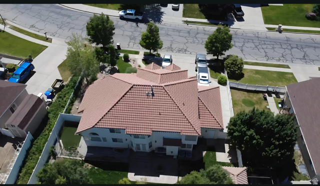 19 South 820 East Tooele, UT 84074 - Photo 2 of 46 Terracotta tile roof house with multiple gables and a two-story rear facade