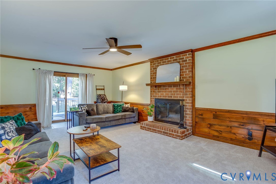 12930 Donegal Drive Chesterfield, VA 23832 - Photo 12 of 43 a living room with furniture and a fireplace