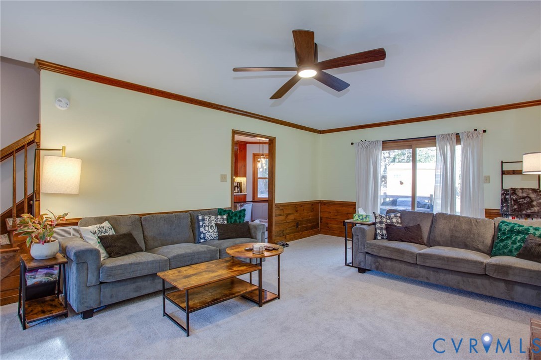 12930 Donegal Drive Chesterfield, VA 23832 - Photo 13 of 43 a living room with furniture and a large window