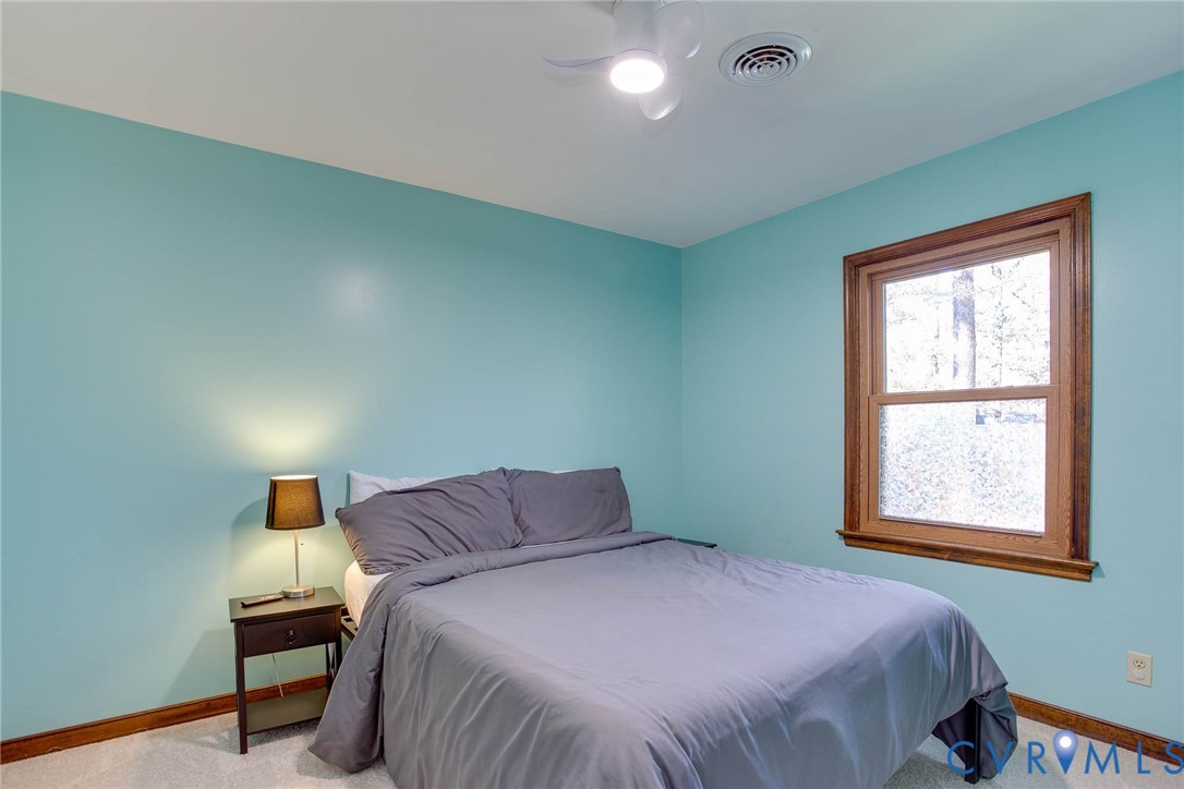 12930 Donegal Drive Chesterfield, VA 23832 - Photo 22 of 43 a bedroom with a bed and window