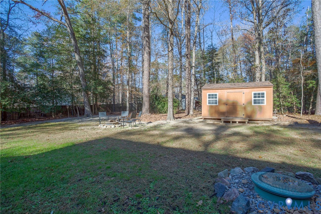 12930 Donegal Drive Chesterfield, VA 23832 - Photo 33 of 43 a view of a house with backyard and trees