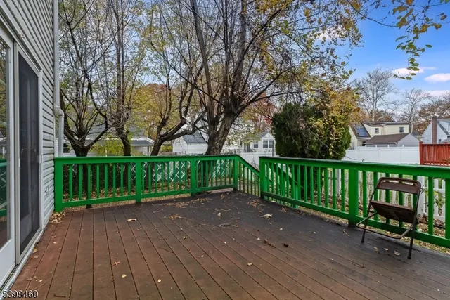 a view of a deck with a yard