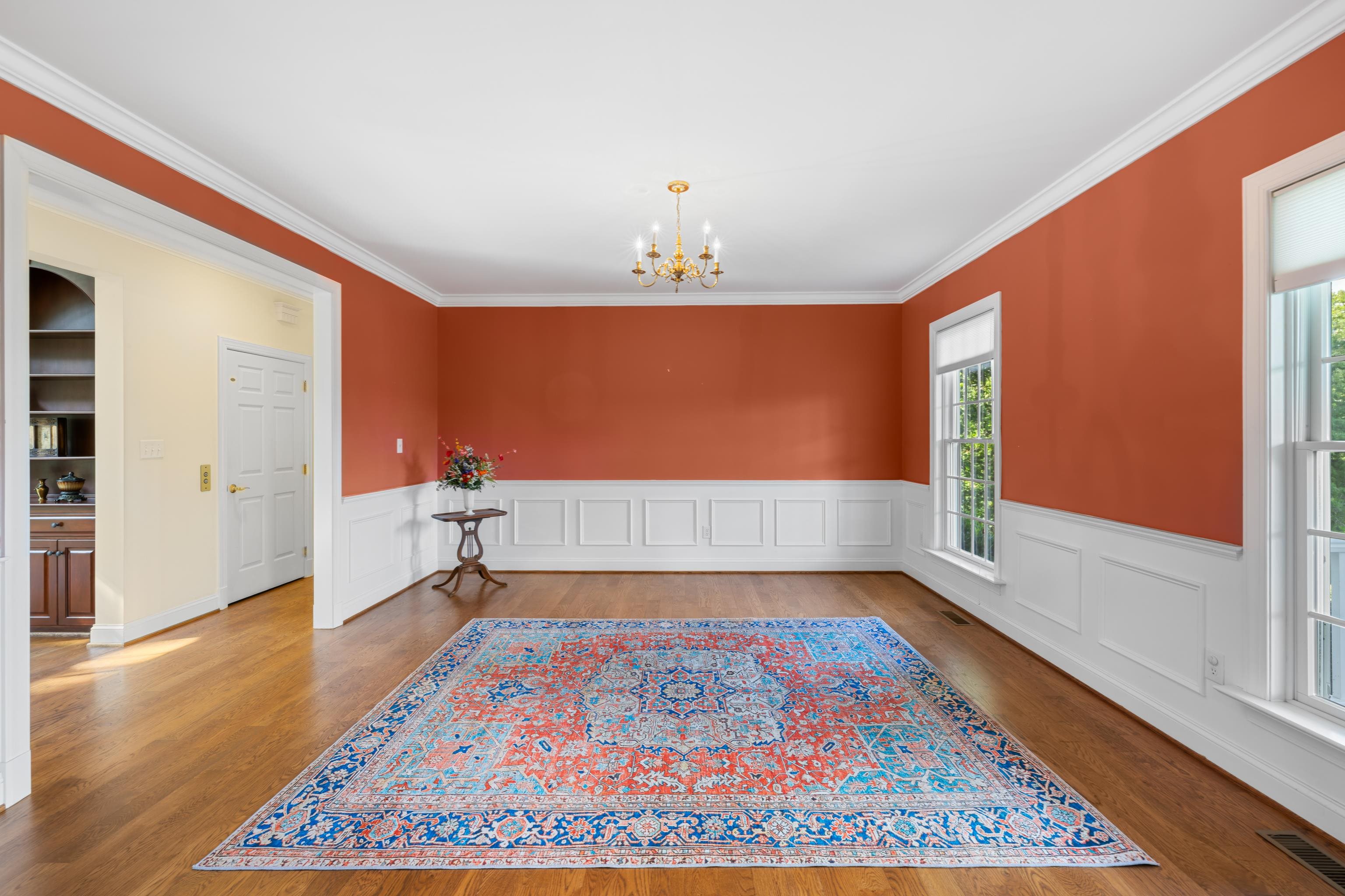 296 Otts Ml Road Raphine, VA 24472 - Photo 11 of 75 a view of a hallway with wooden floor and a chandelier