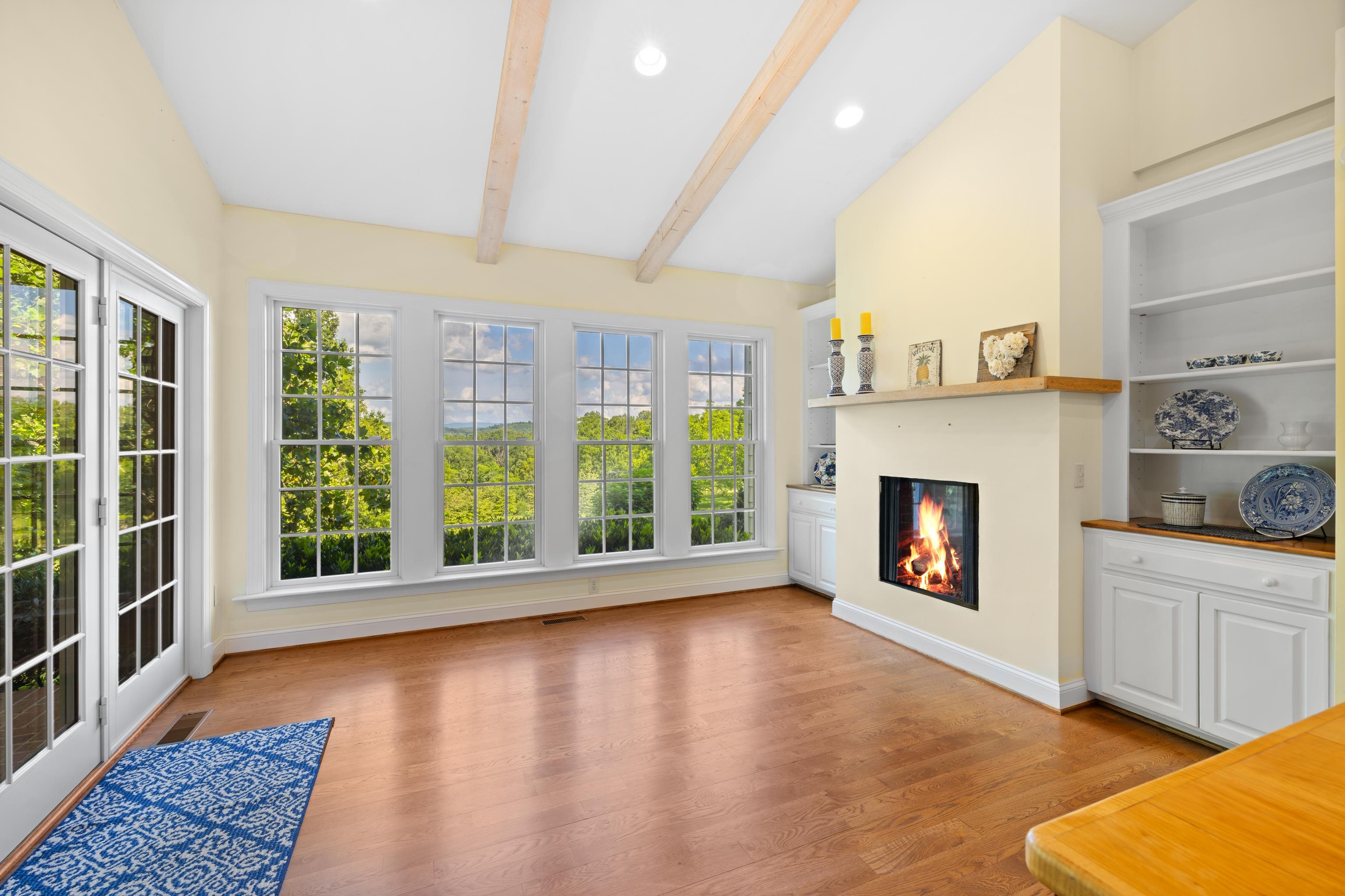 296 Otts Ml Road Raphine, VA 24472 - Photo 22 of 75 a view of an empty room with a fireplace and a window
