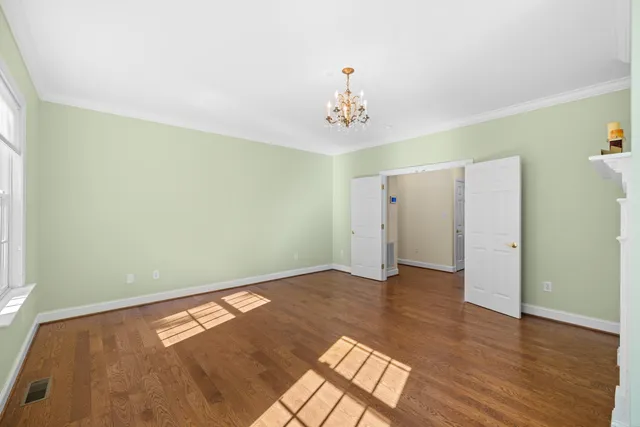 a view of a balcony with wooden floor