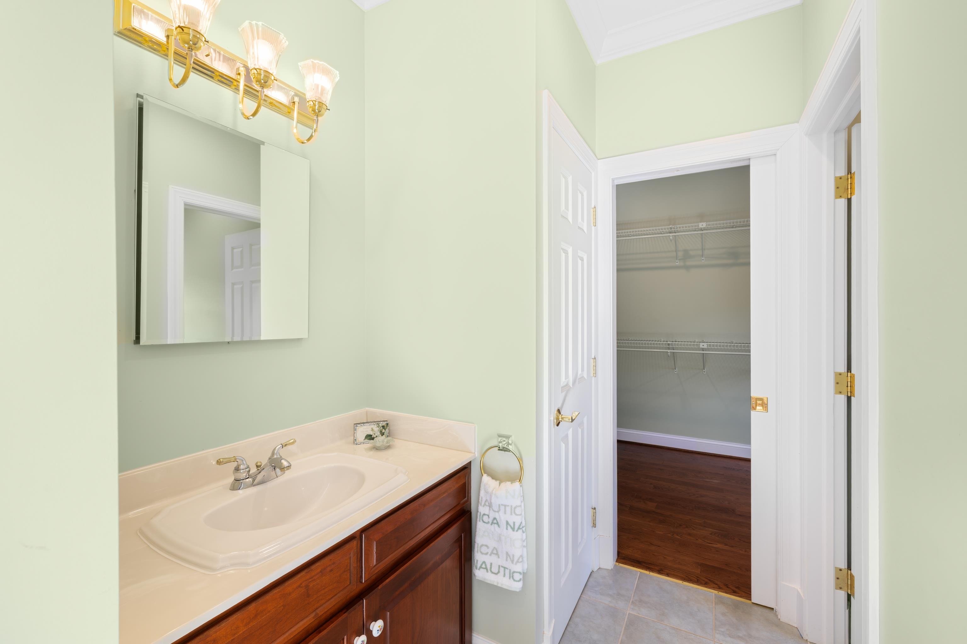 296 Otts Ml Road Raphine, VA 24472 - Photo 34 of 75 a bathroom with a sink and a mirror