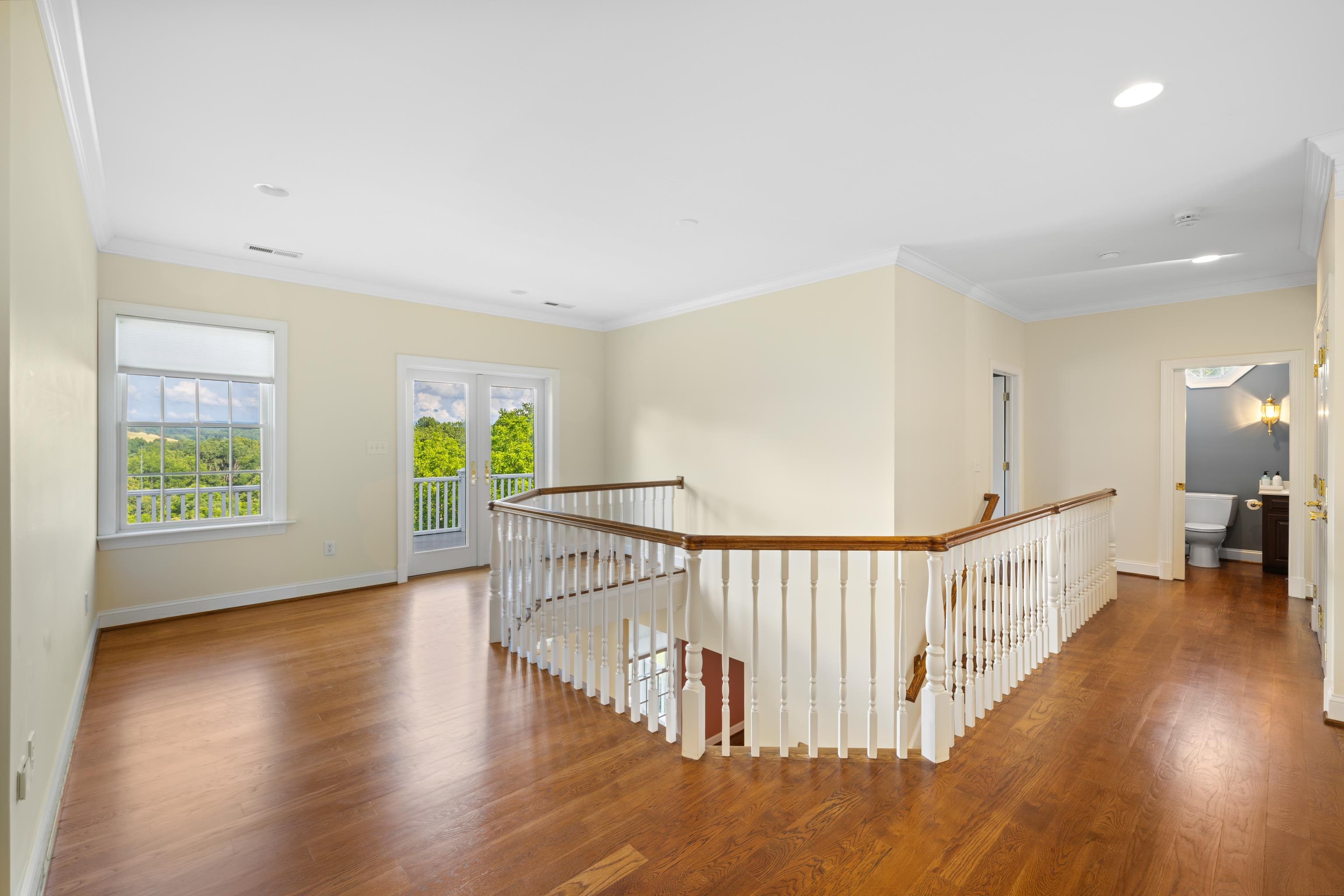 296 Otts Ml Road Raphine, VA 24472 - Photo 43 of 75 a view of an empty room with wooden floor and a window