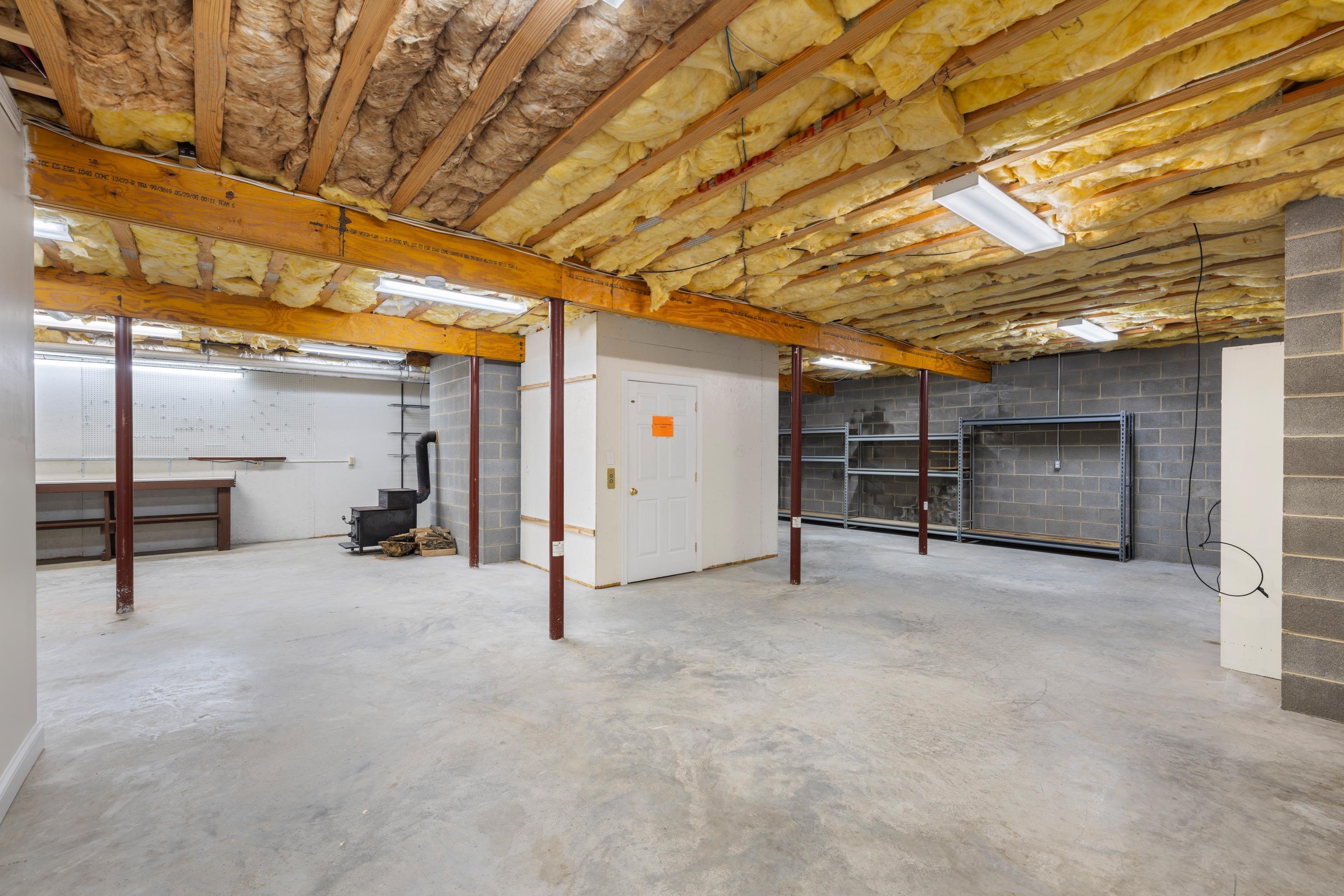 296 Otts Ml Road Raphine, VA 24472 - Photo 58 of 75 a view of a big room with wooden roof and storage