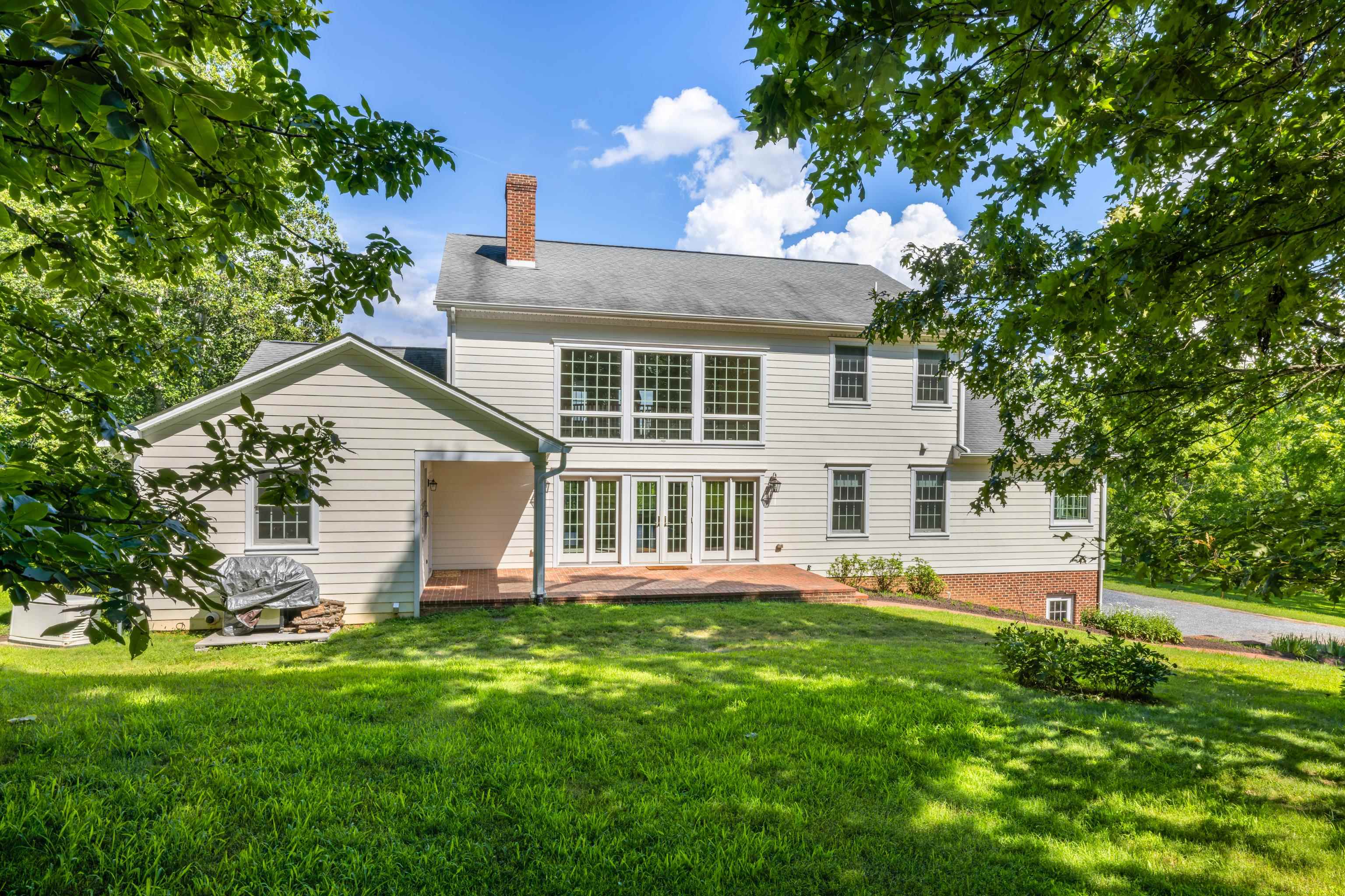 296 Otts Ml Road Raphine, VA 24472 - Photo 63 of 75 a front view of a house with a yard and trees