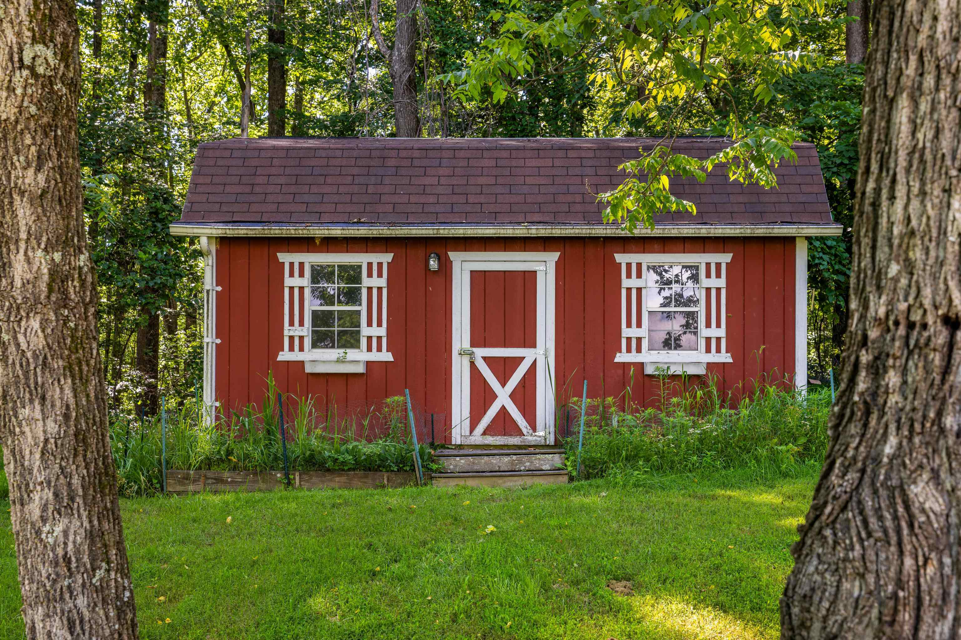 296 Otts Ml Road Raphine, VA 24472 - Photo 65 of 75 a front view of a house with garden