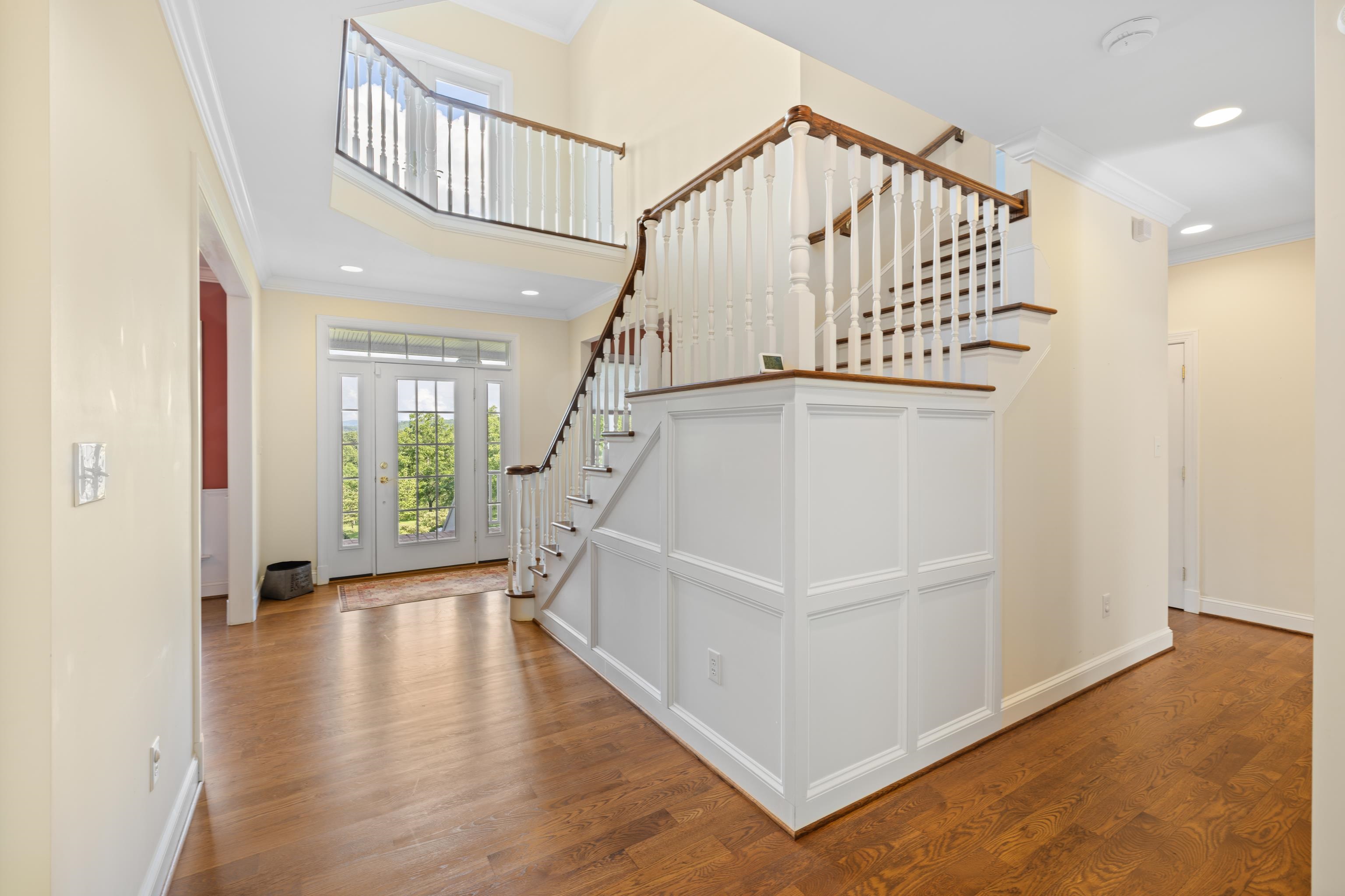 296 Otts Ml Road Raphine, VA 24472 - Photo 9 of 75 a view of entryway with wooden floor and stairs