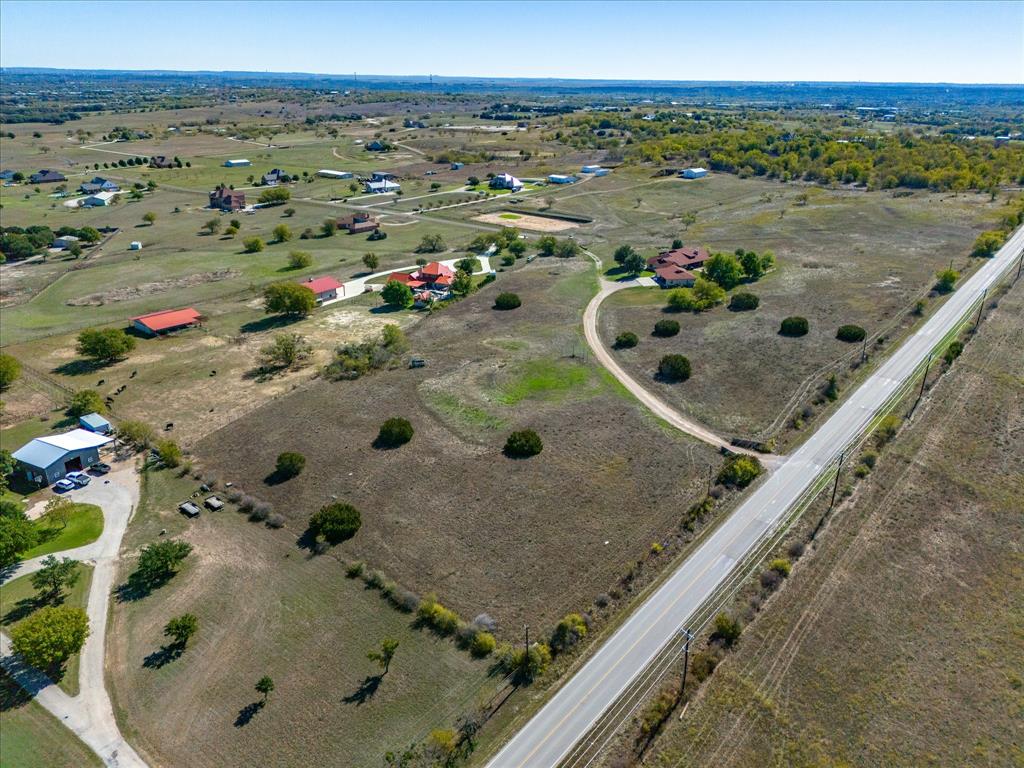 Tbd 3-acres Tbd 3-acres Kelly Road Aledo, TX 76008 - Photo 7 of 10 an aerial view of a swimming pool with lounge chair