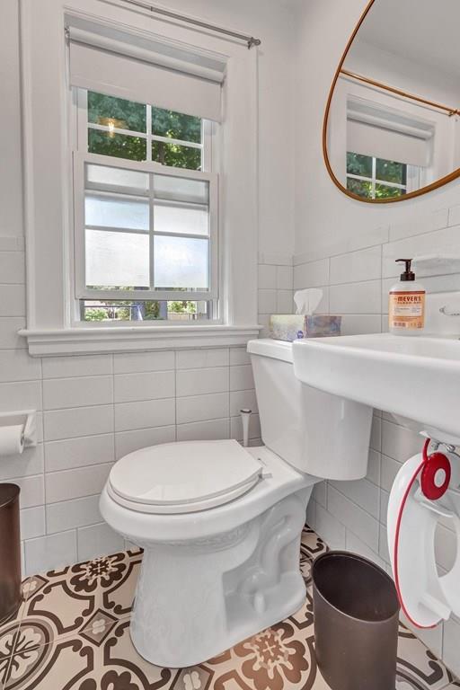 29 Waldeck Road Milton, MA 02186 - Photo 11 of 13 a bathroom with a toilet a sink and a mirror