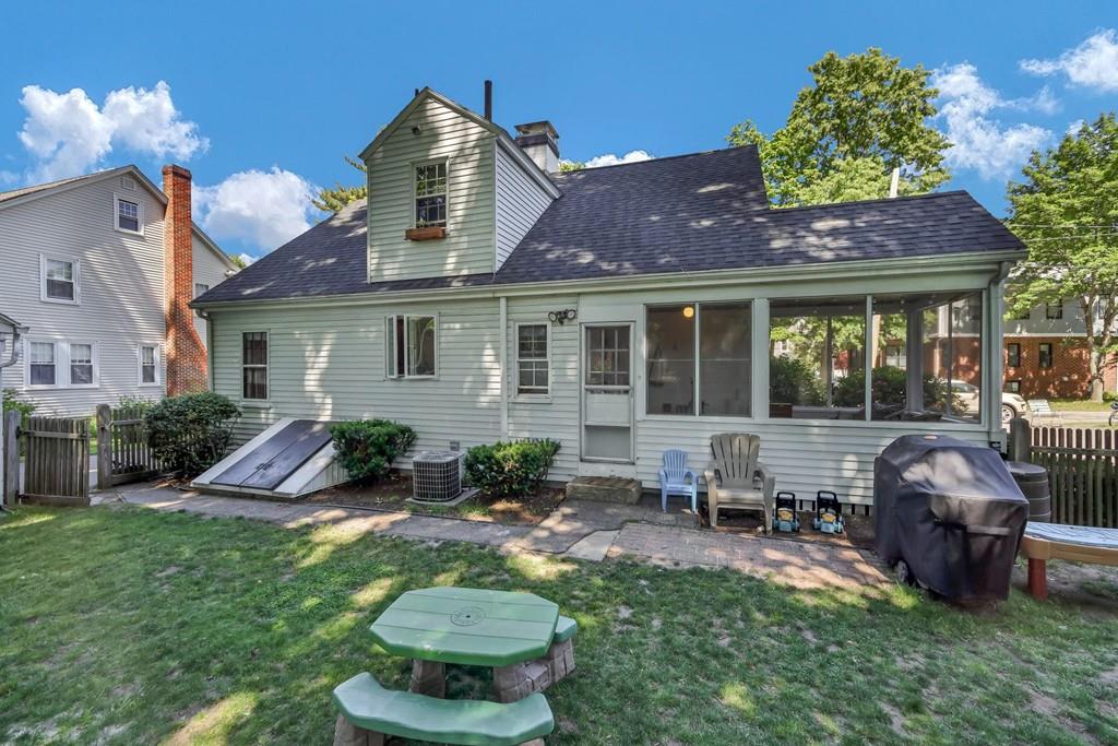 29 Waldeck Road Milton, MA 02186 - Photo 13 of 13 a front view of house with a garden and patio