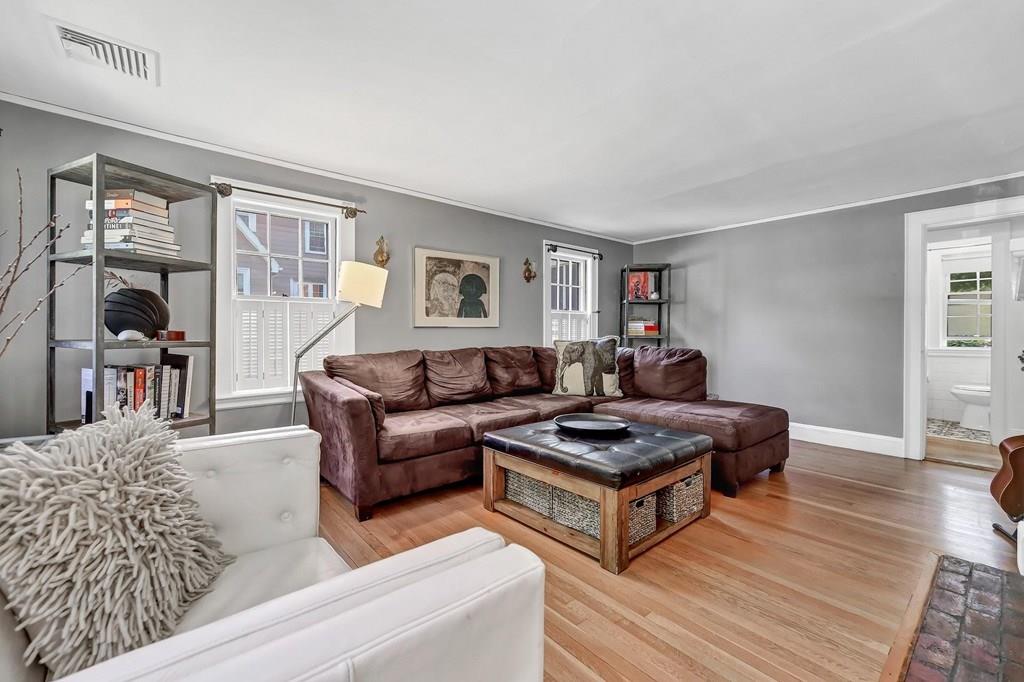 29 Waldeck Road Milton, MA 02186 - Photo 3 of 13 a living room with furniture and a window