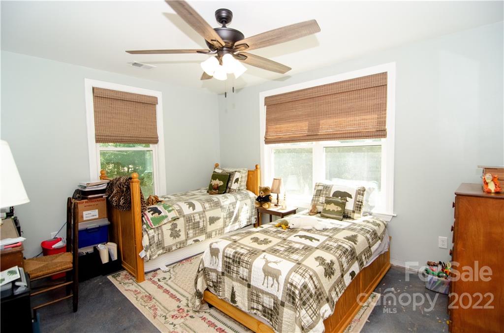 3267 Park Road Ridgeway, SC 29130 - Photo 23 of 40 a bed room with two beds and a window