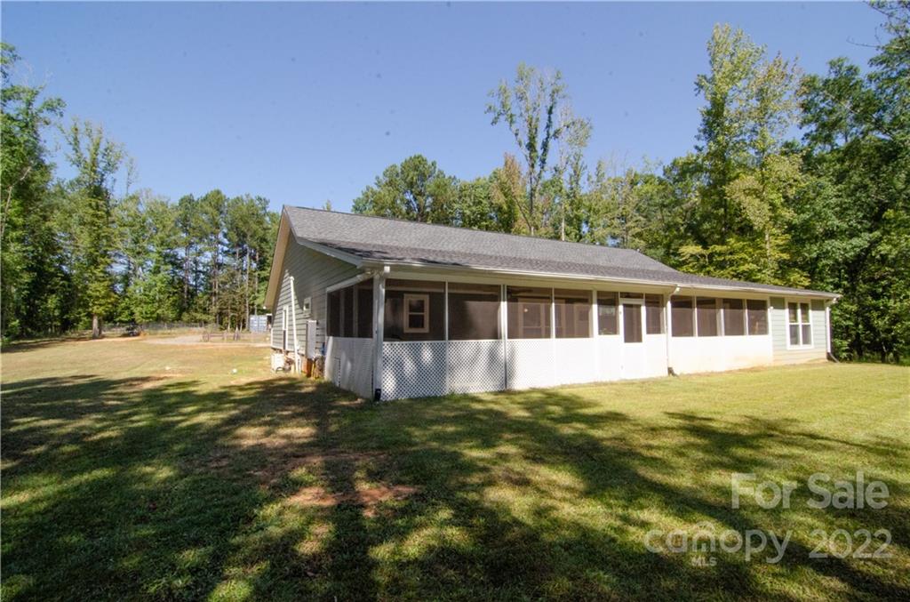 3267 Park Road Ridgeway, SC 29130 - Photo 30 of 40 a front view of a house with a garden
