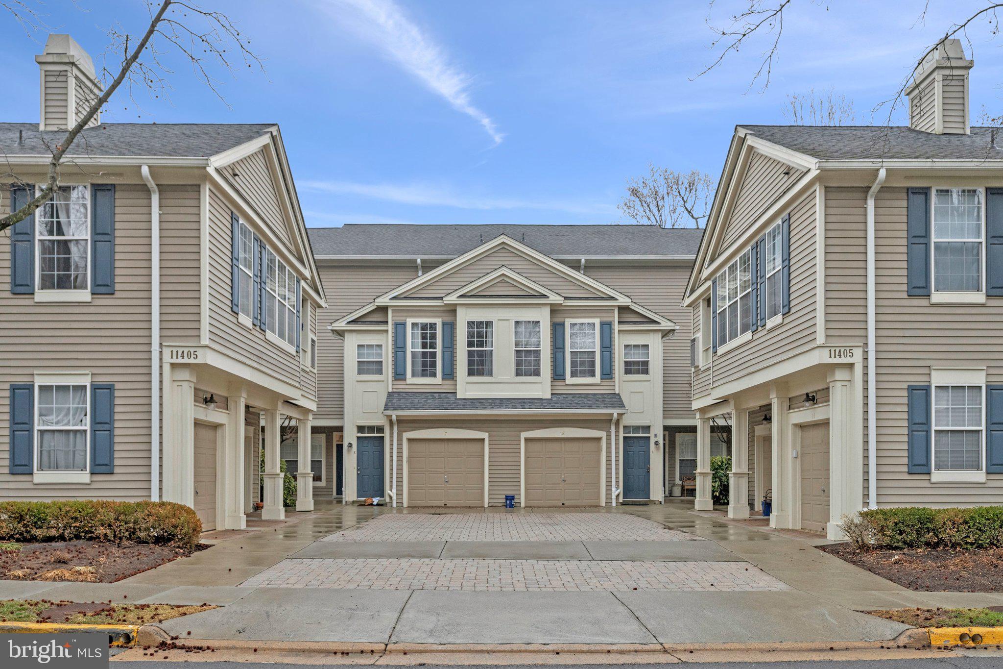 11405 Windleaf Court, Unit 23 Reston, VA 20194 - Photo 1 of 24 a view of a building with a window