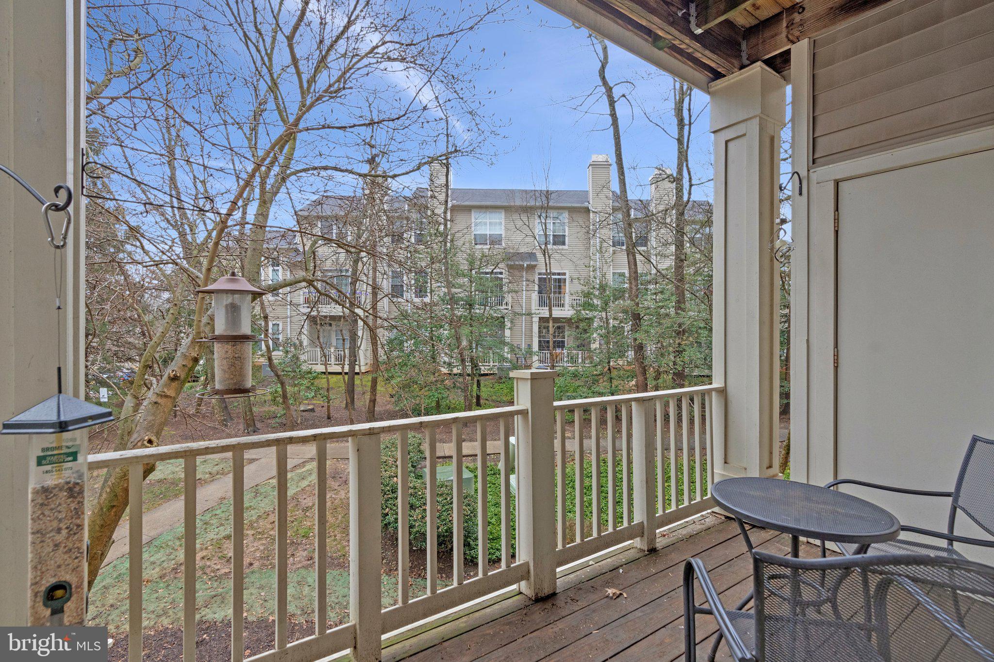 11405 Windleaf Court, Unit 23 Reston, VA 20194 - Photo 20 of 24 a view of a chair and table in the balcony